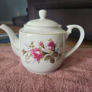 Tea pot with sugar and creamer